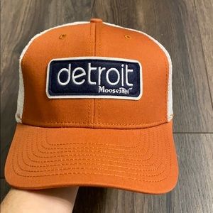 Moosejaw Detroit hat brownish orange color